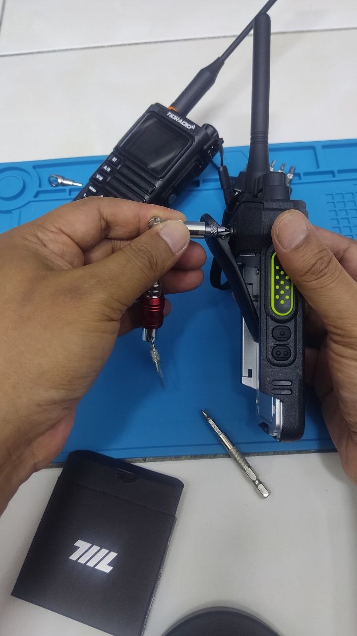 711L Pen Driver TS folded at 90-degree angle fitting under radio belt clip