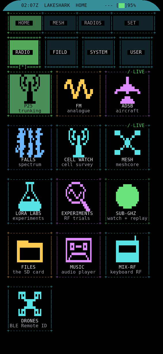 LakeShark HOME launcher grid on T-Display P4 showing P25, FM, ADS-B, FALLS, MESH, LoRa Labs, Sub-GHz and Drones apps